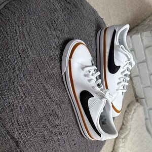 Nike brand new White Sneakers with Black Swoosh and Brown Accent